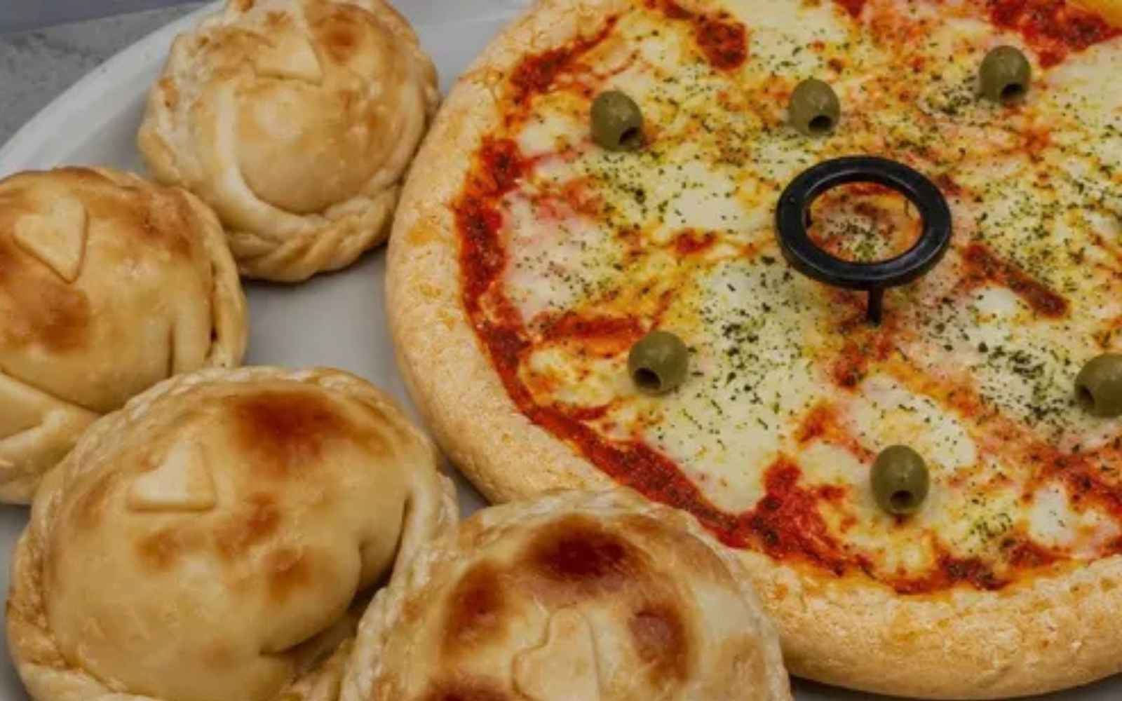 Pizza grande + docena de empanadas